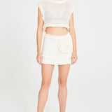 White Crochet Mini Skirt With Ruffle And Flower Details