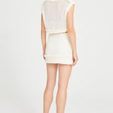 White Crochet Mini Skirt With Ruffle And Flower Details