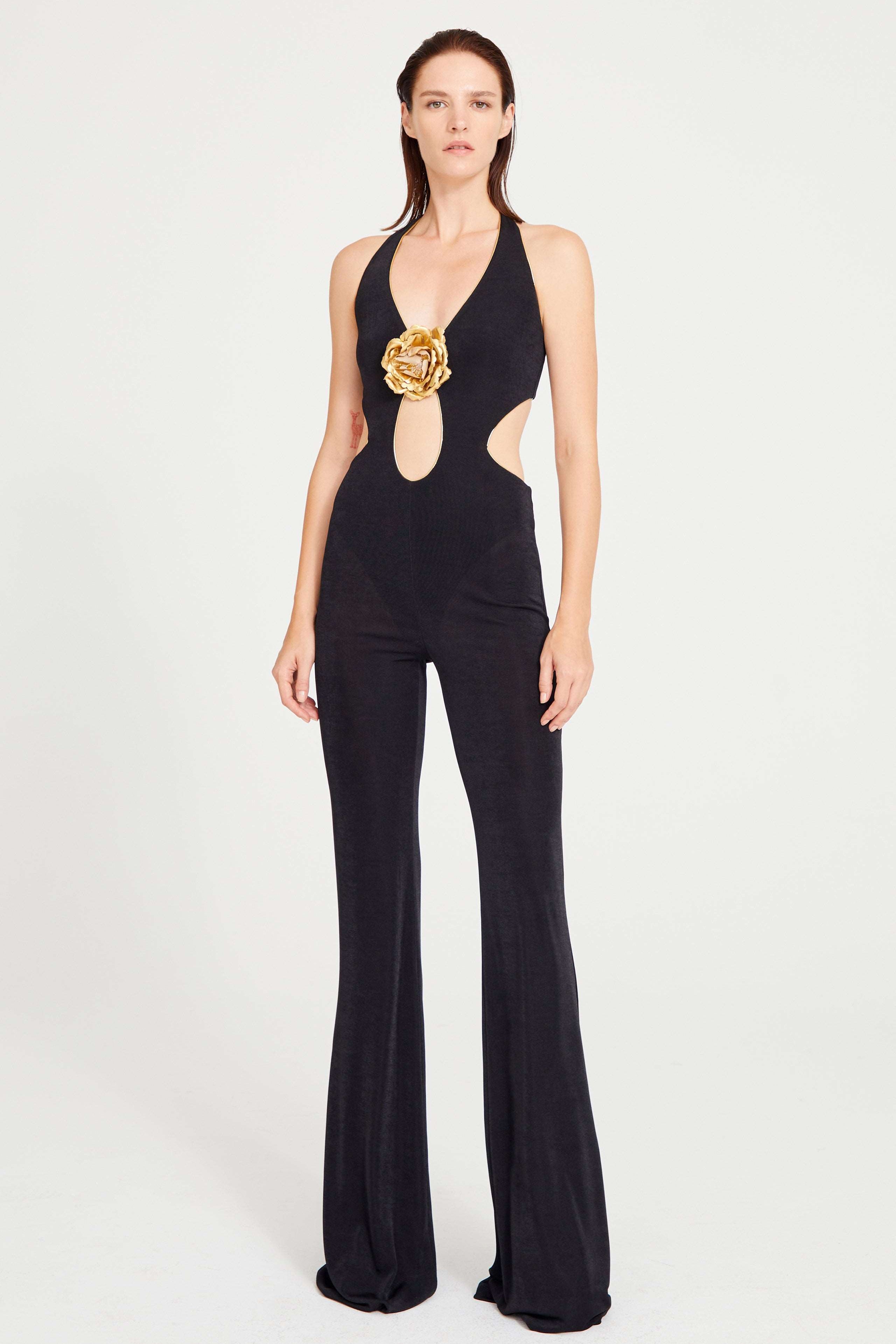 Black Jumpsuit With Gold Lining And Flower Details