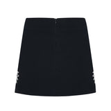Black Crepe Mini Skirt With Patent Flower Detail