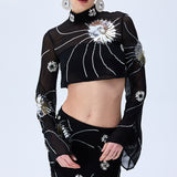 Black Sequined Chiffon Top With Patent Flowers And Flare Sleeves