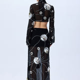 Black Sequined Chiffon Top With Patent Flowers And Flare Sleeves