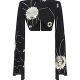 Black Sequined Jersey Top With Patent Flowers And Flare Sleeves