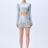 Metallic Knitted Mini Skirt With Patent Feathers