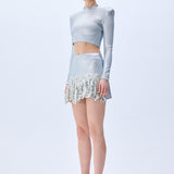 Metallic Knitted Mini Skirt With Patent Feathers