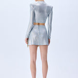 Metallic Knitted Mini Skirt With Patent Feathers