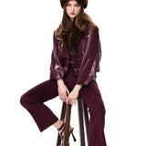 Burgundy Suede Pants With Leather Details And Gold Accessories