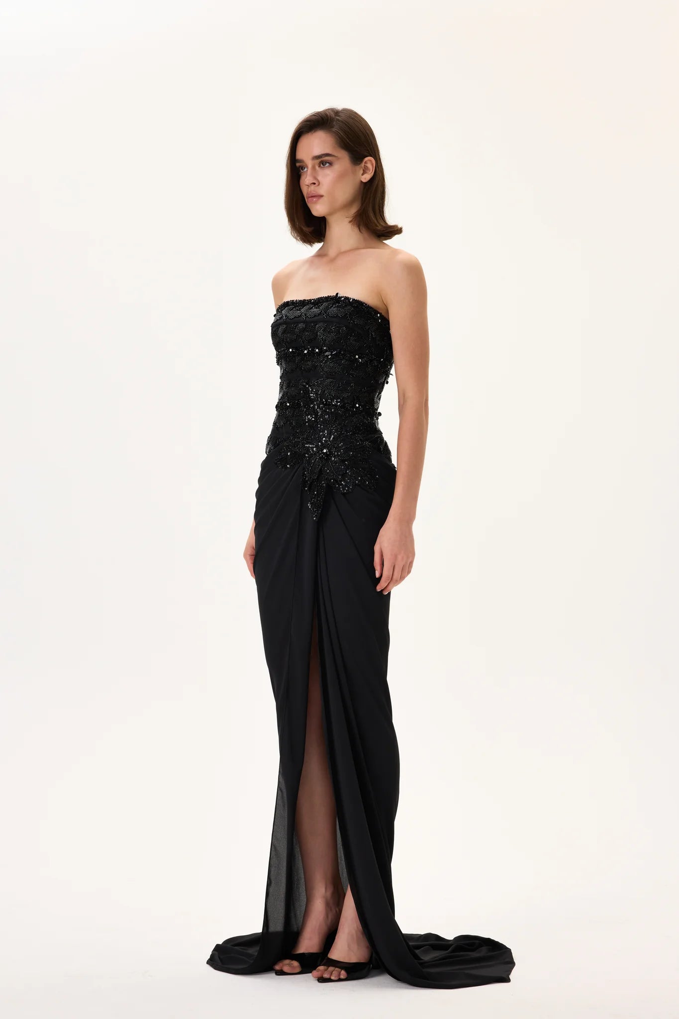 SS26-D-1049-36 raisa_vanessa black-gown-with-beaded-leaf-motive-striped-corset-top-and-fully-embroidered-flower-detail