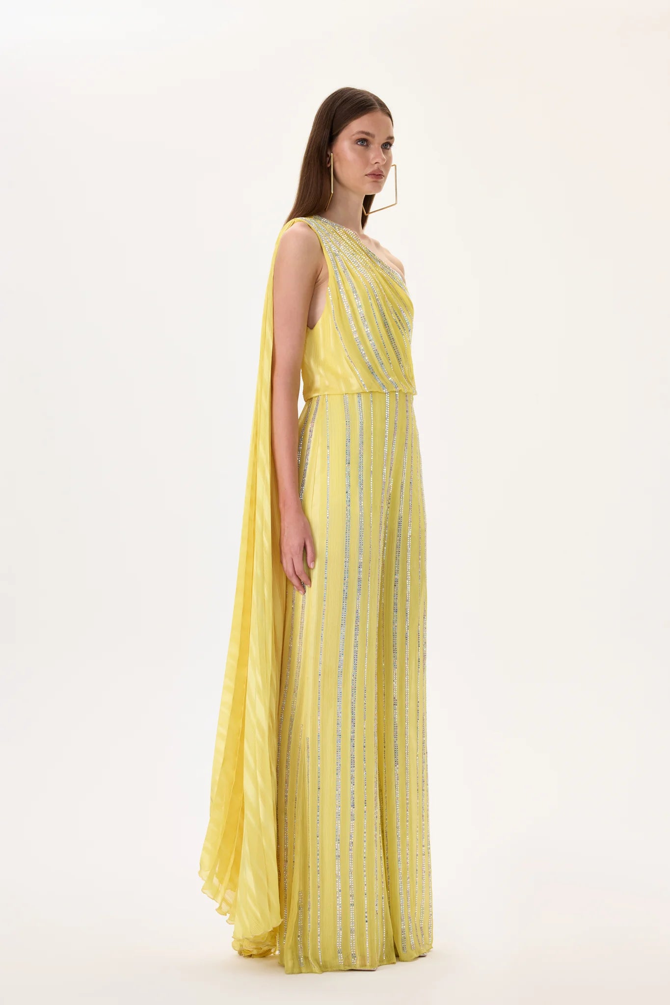 SS26-JS-1004-38 raisa_vanessa yellow-crystal-printed-chiffon-jumpsuit-with-pleated-half-cape