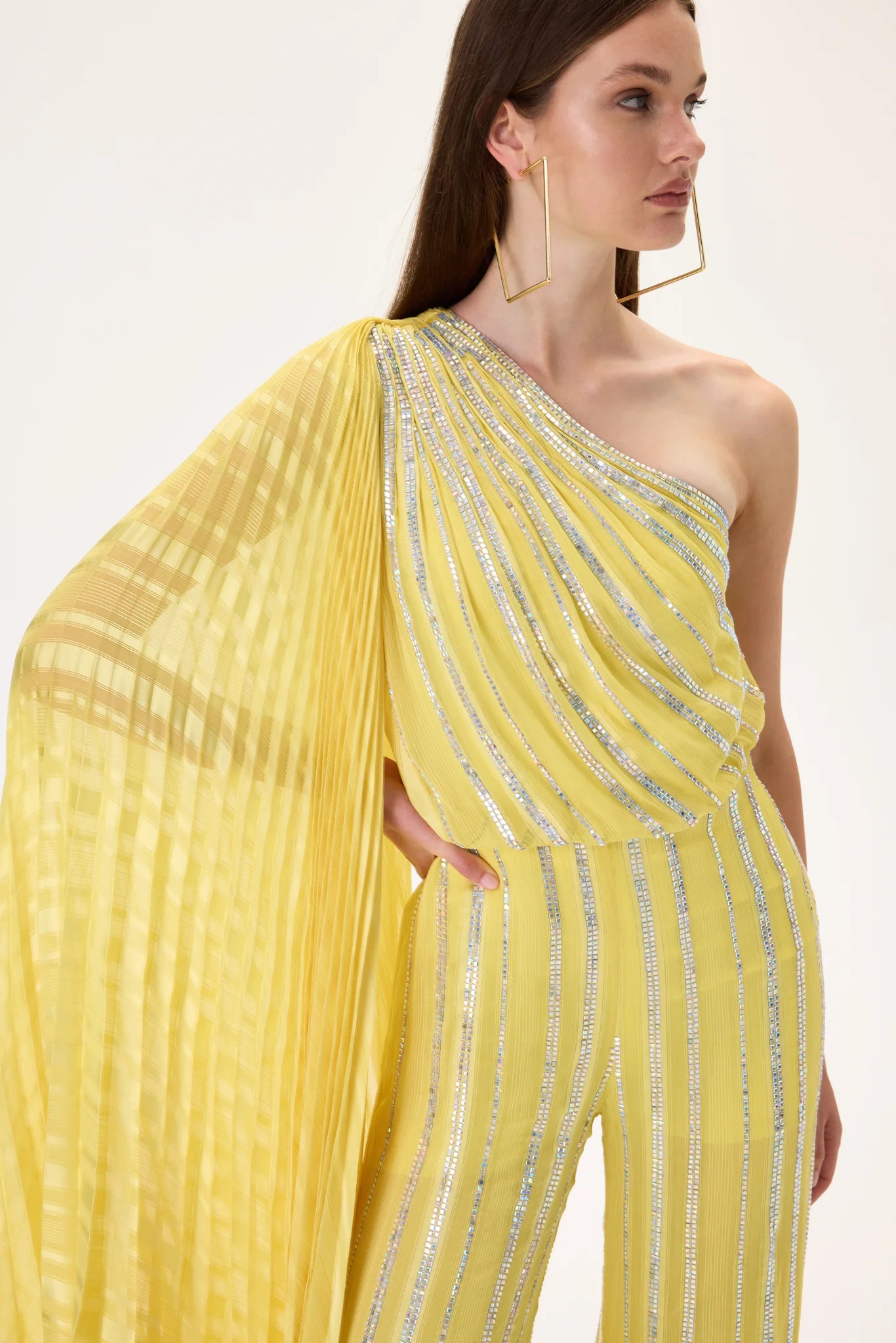 SS26-JS-1004-42 raisa_vanessa yellow-crystal-printed-chiffon-jumpsuit-with-pleated-half-cape