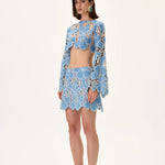 SS26-S-1002-36 raisa_vanessa denim-lace-mini-skirt-with-gold-metal-centered-flower-embroidery