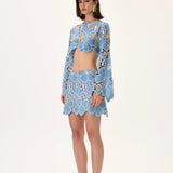 SS26-S-1002-36 raisa_vanessa denim-lace-mini-skirt-with-gold-metal-centered-flower-embroidery