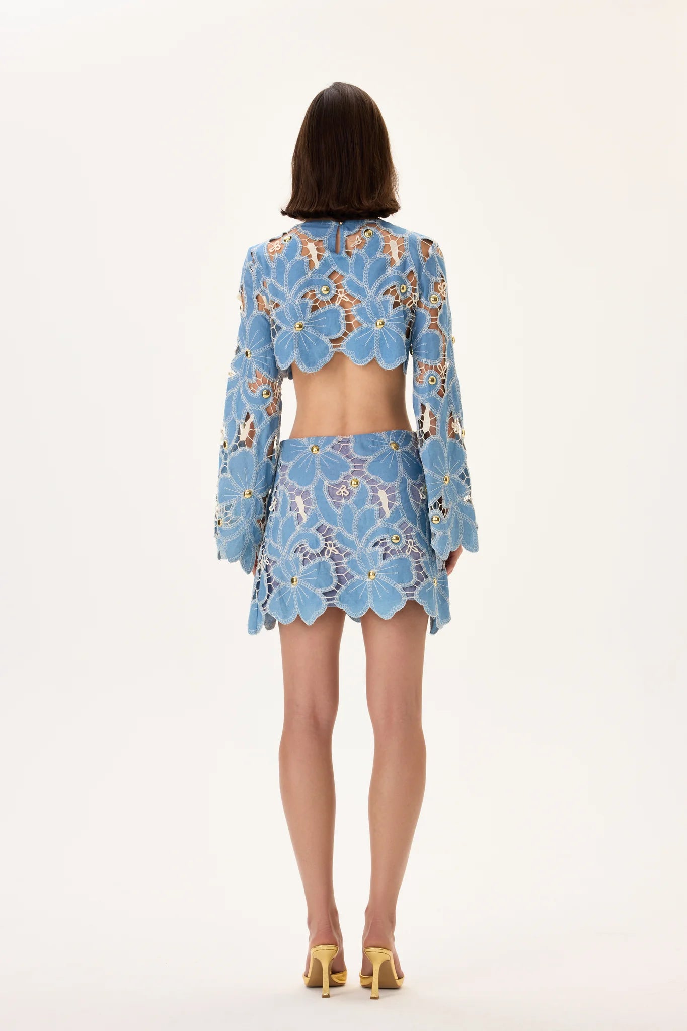 SS26-S-1002-38 raisa_vanessa denim-lace-mini-skirt-with-gold-metal-centered-flower-embroidery