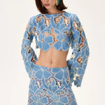 SS26-S-1002-40 raisa_vanessa denim-lace-mini-skirt-with-gold-metal-centered-flower-embroidery