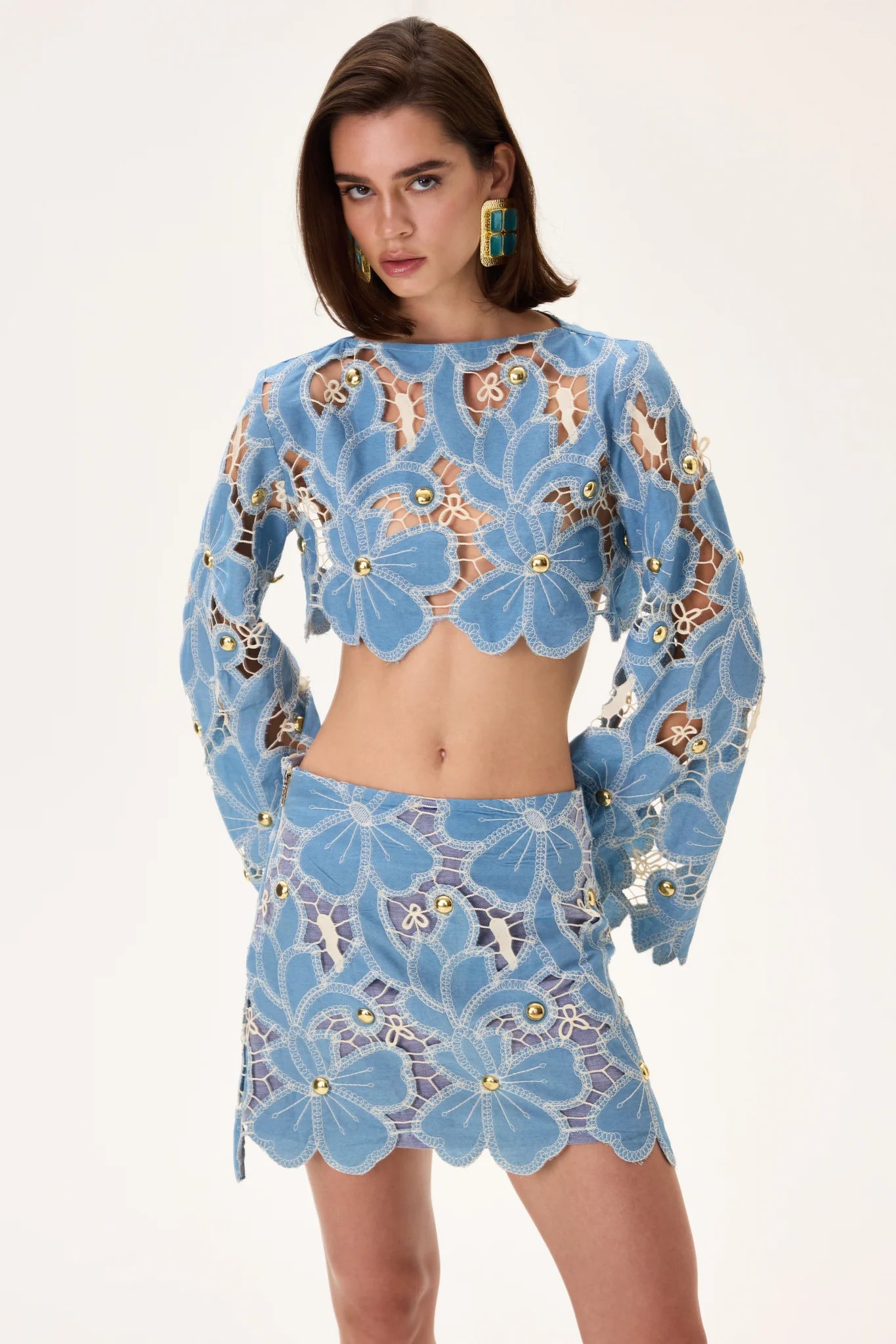 SS26-S-1002-40 raisa_vanessa denim-lace-mini-skirt-with-gold-metal-centered-flower-embroidery