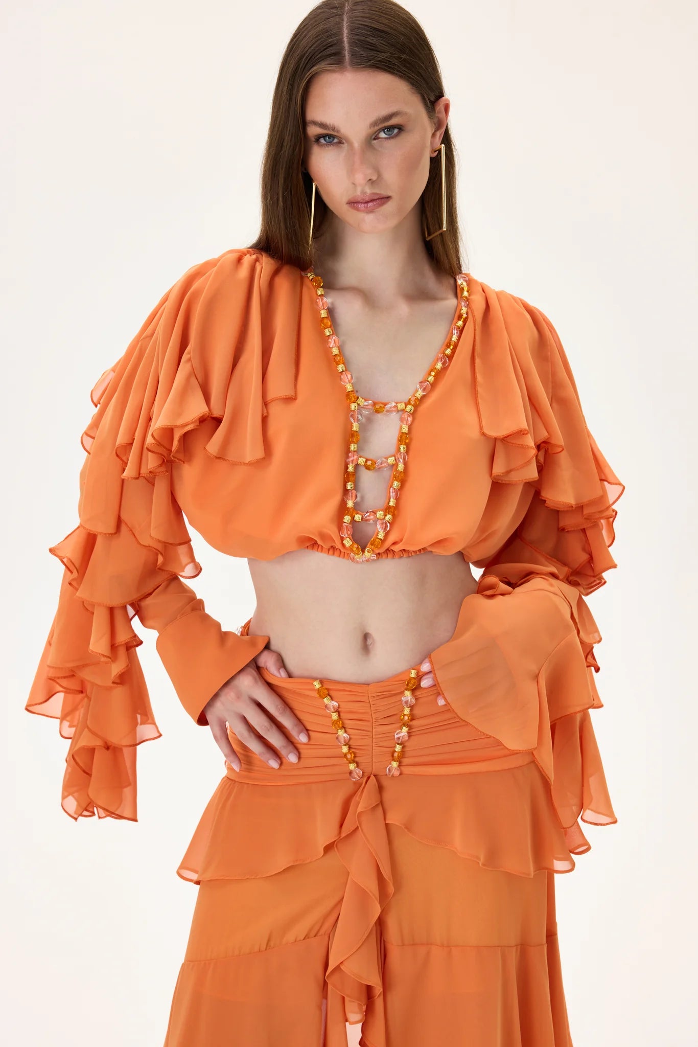 SS26-T-1029-40 raisa_vanessa orange-chiffon-crop-top-with-ruffled-sleeves-and-stoned-neckline