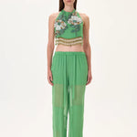 SS26-T-1030-34 raisa_vanessa chiffon-crystal-flower-appliqued-halter-neck-crop-top-with-hand-embroidered-beaded-fringes