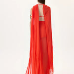 SS26-T-1033-38 raisa_vanessa vivid-pomegranate-chiffon-one-shouldered-cape-top