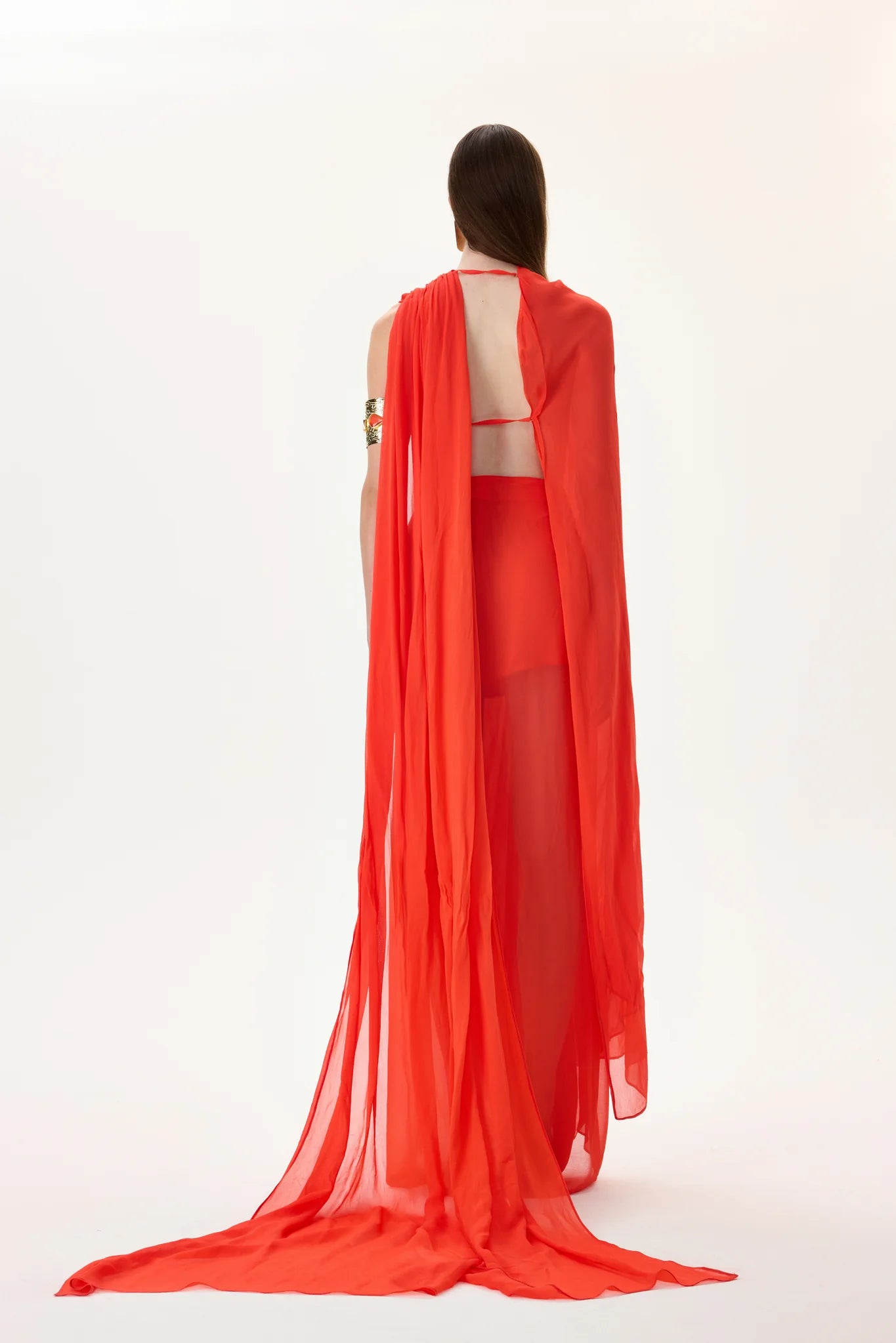 SS26-T-1033-38 raisa_vanessa vivid-pomegranate-chiffon-one-shouldered-cape-top